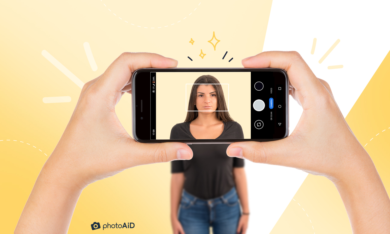 A woman having her US passport photo taken with an Android phone.