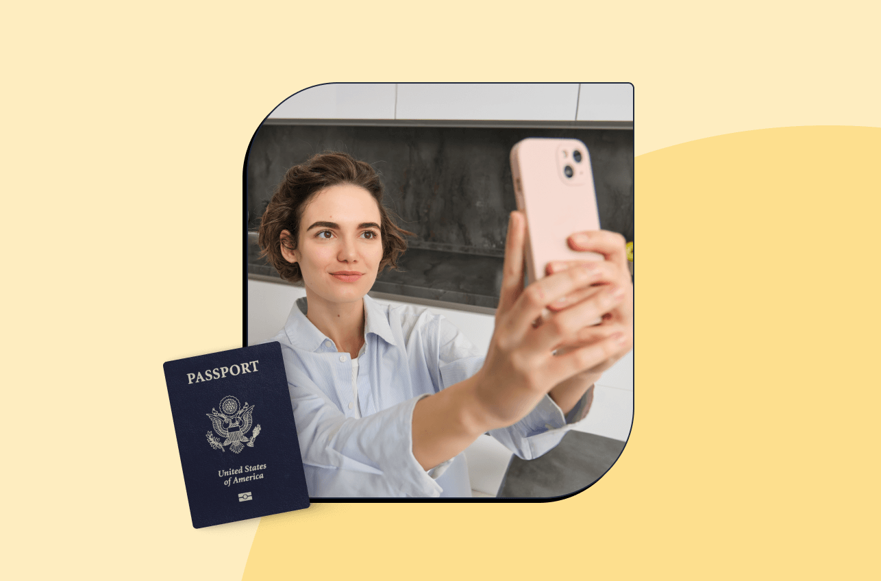 Person taking a passport photo at home with a phone’s camera.]