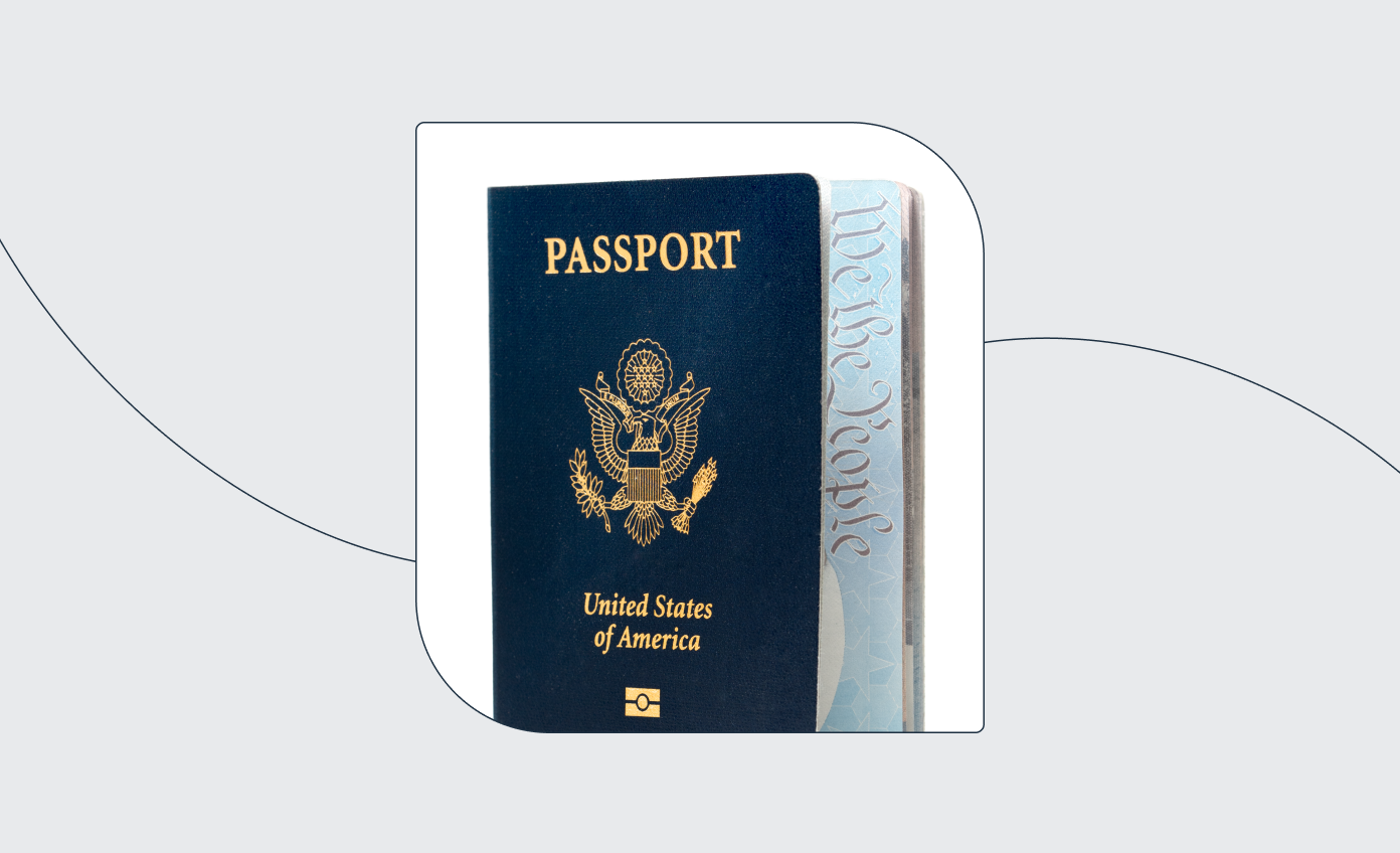 A US passport half-open on the first page
