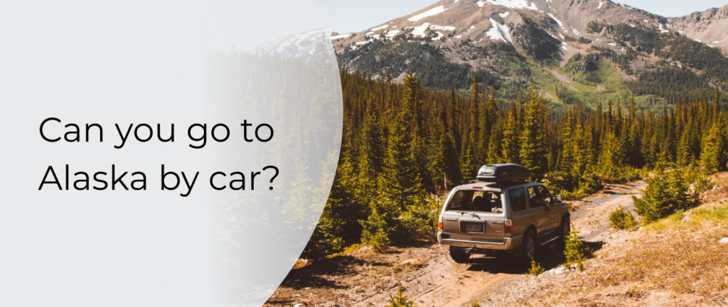 Car driving on a scenic Alaskan road with mountains in the background.