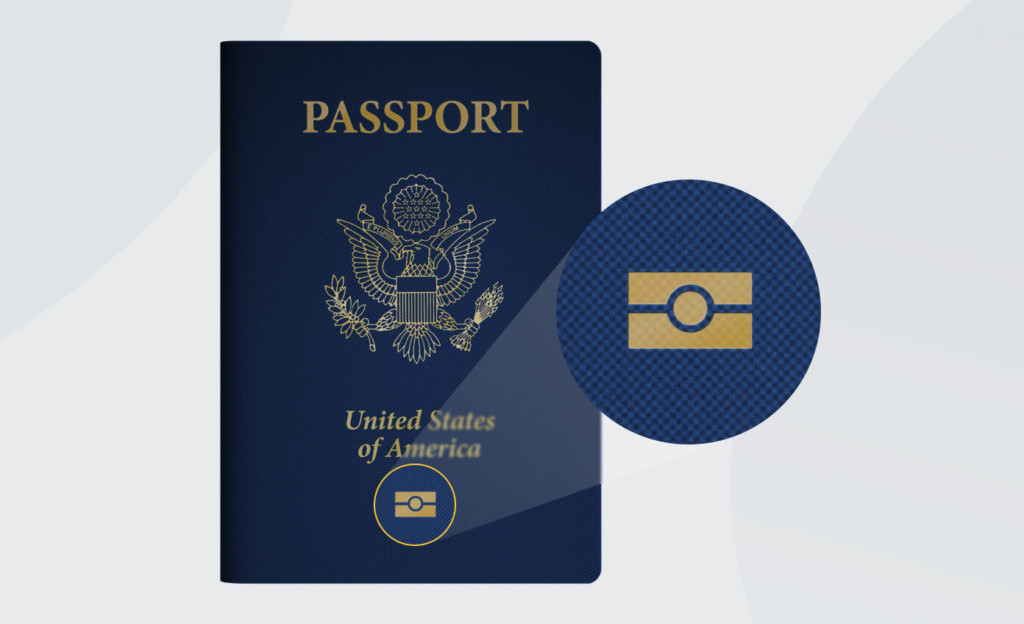 Biometric Passport U.S. biometric passport cover with a close-up of the embedded chip symbol, highlighting key features of a biometric passport for identification and security.