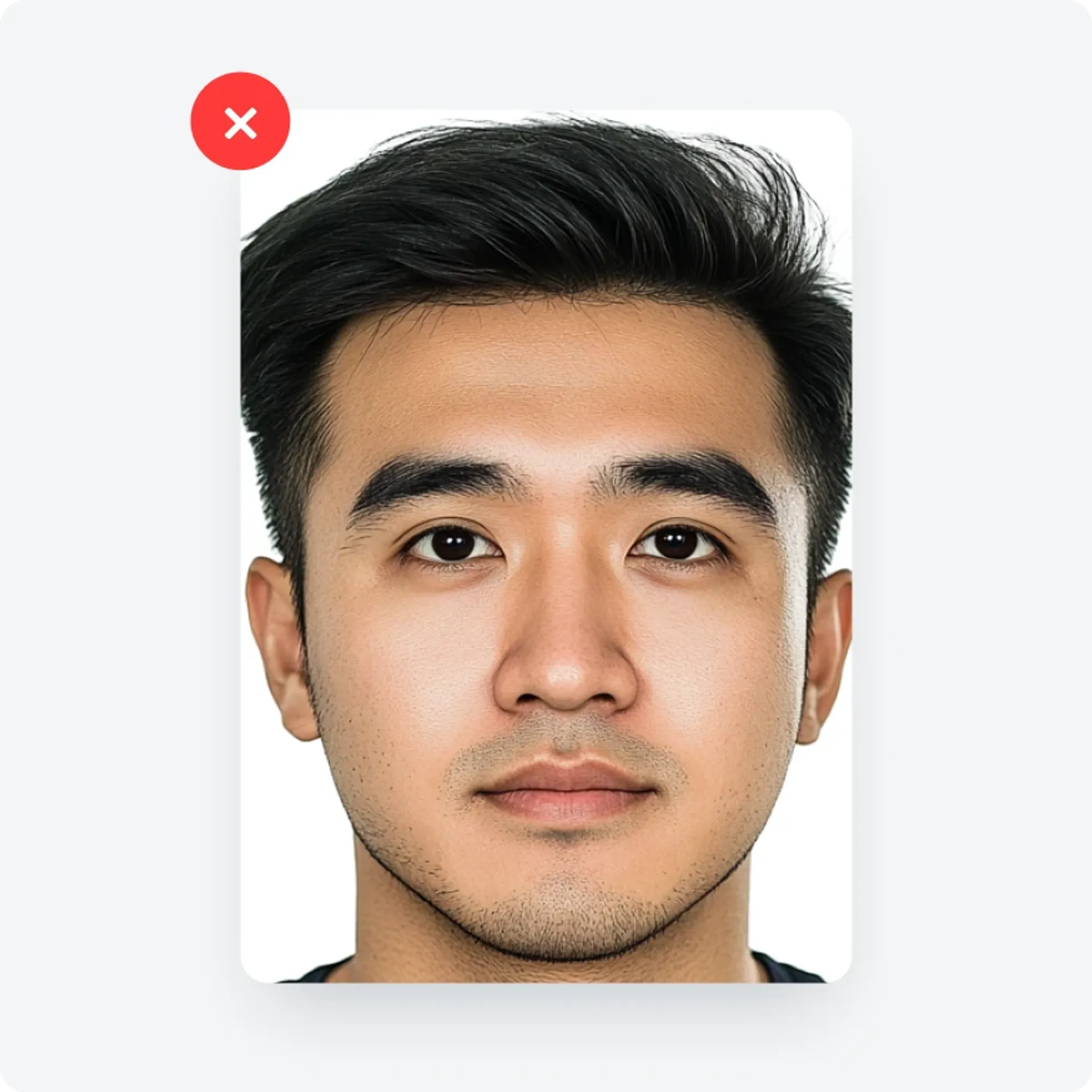 Bad Malaysian passport photo: Too zoomed in, ears too close to the edges.