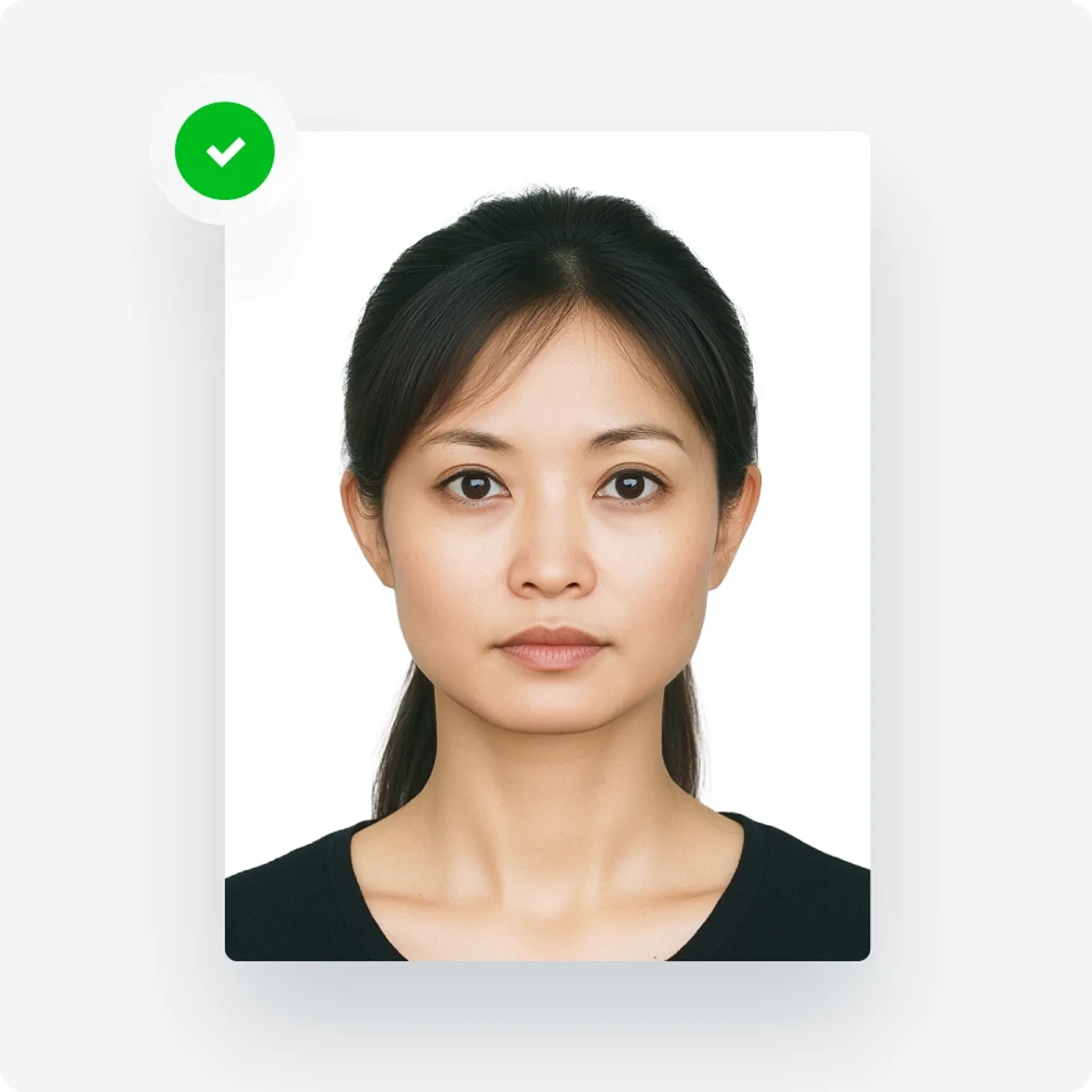 Passport photo background and the subject’s face are evenly lit.