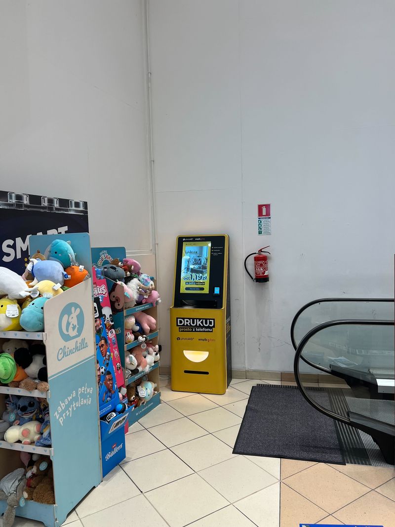 Wywoływanie zdjęć i druk A4 w foto kiosku PhotoAiD w Empik Aleja Bielany
