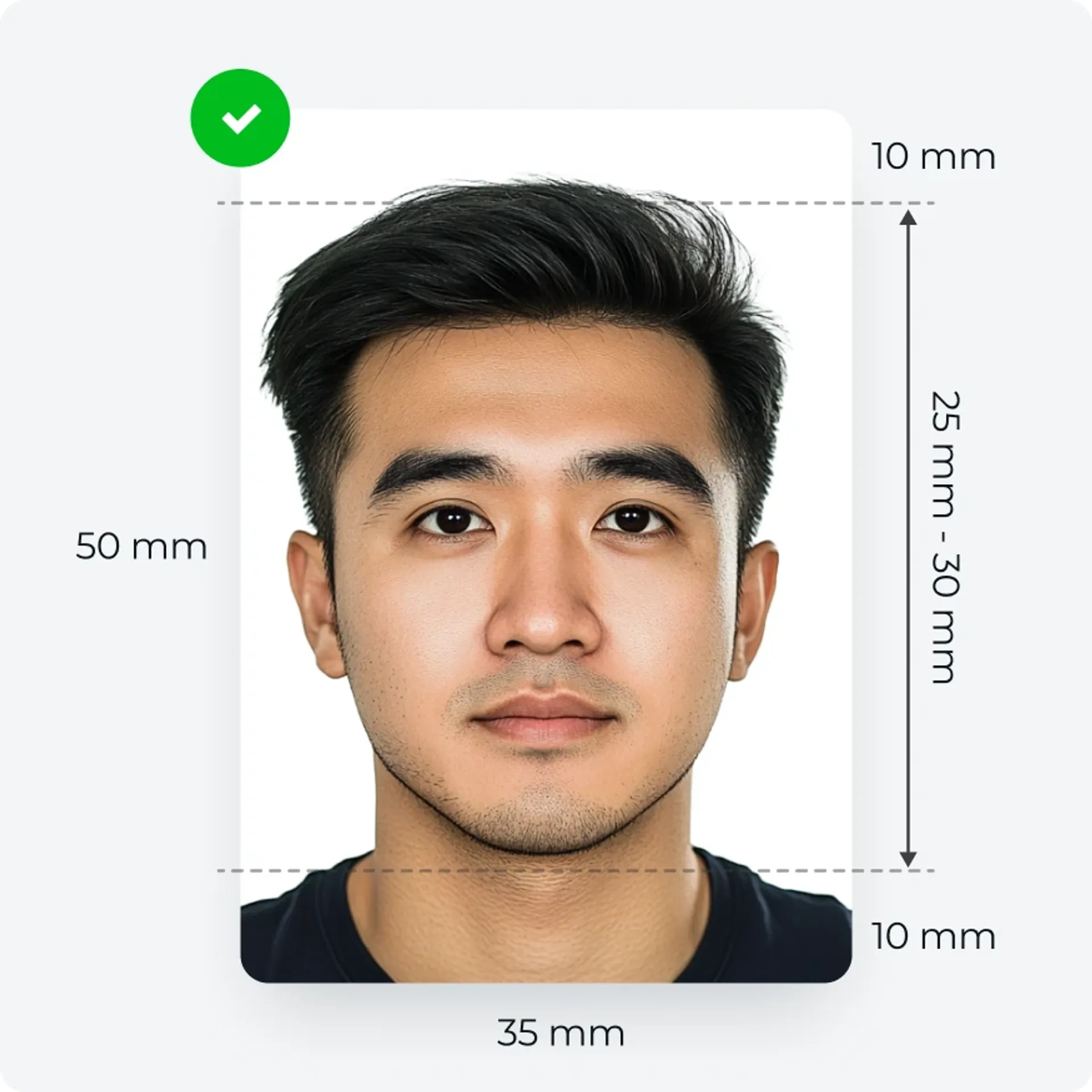 Malaysian passport photo with correct measurements and facial expression.