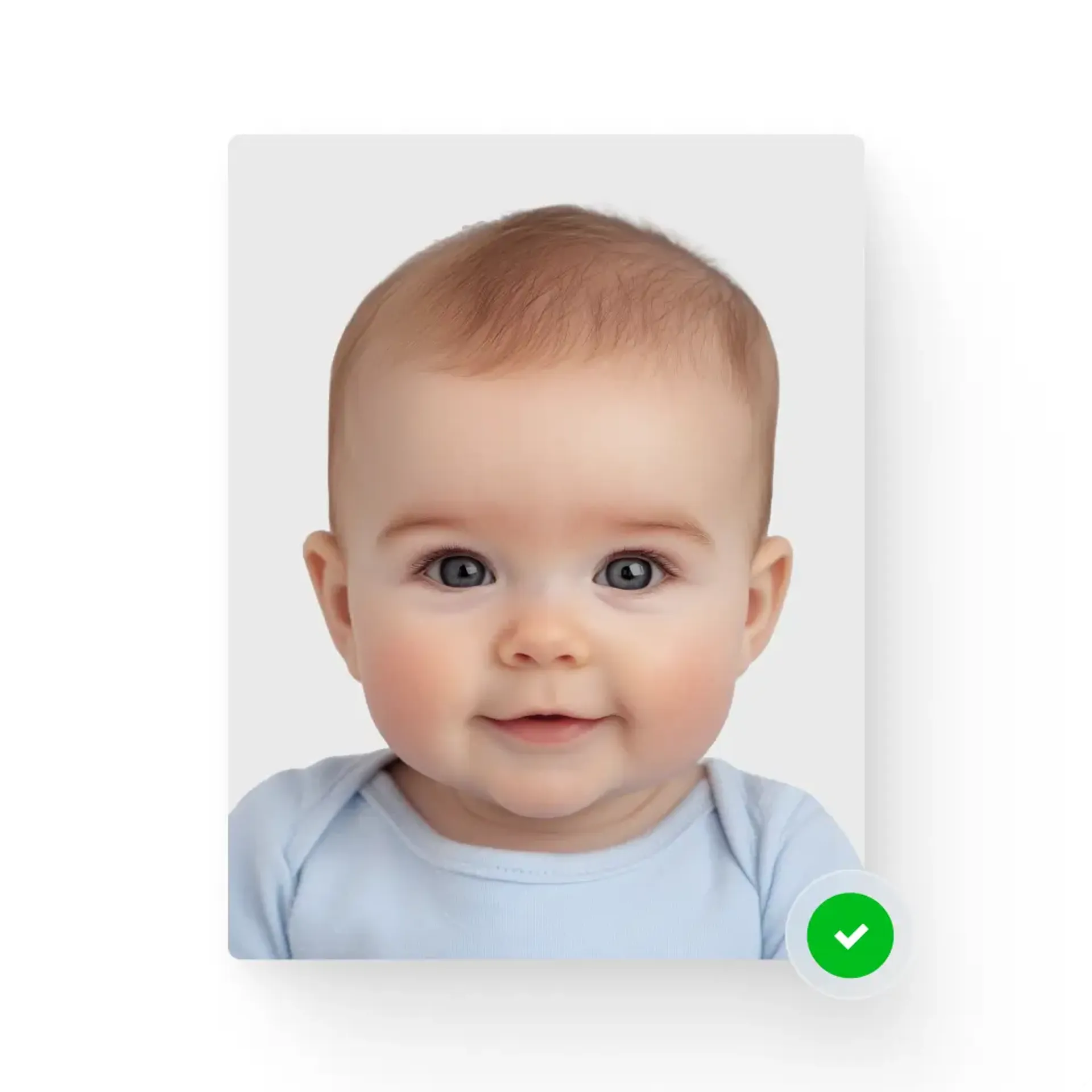 Baby smiling gently in a passport photo.